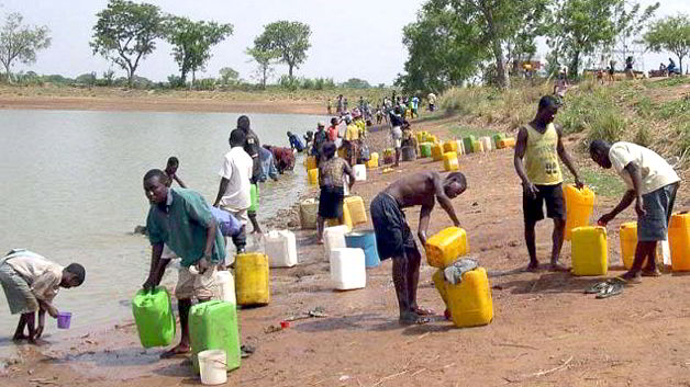 Rural dwellers fetching water from a local lake in Northern Ghana by Izumi Kikkawa-2