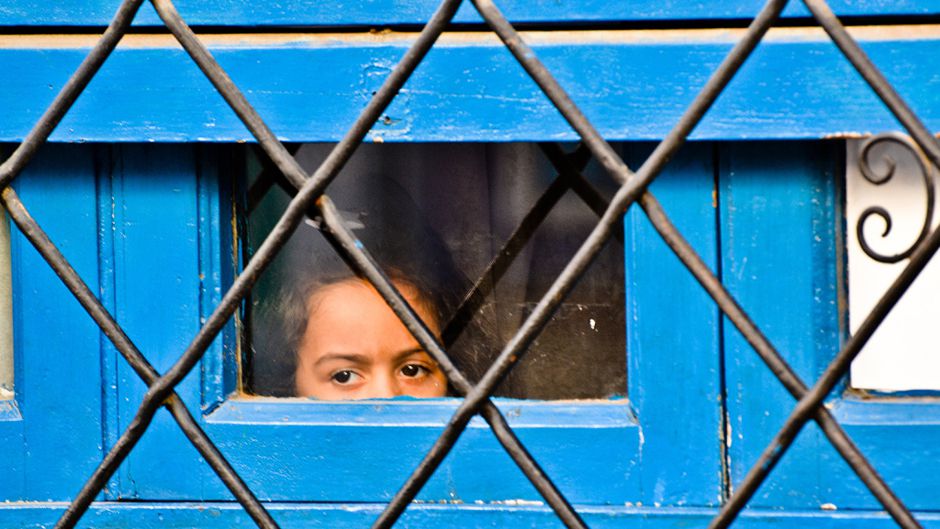 girl in blue window
