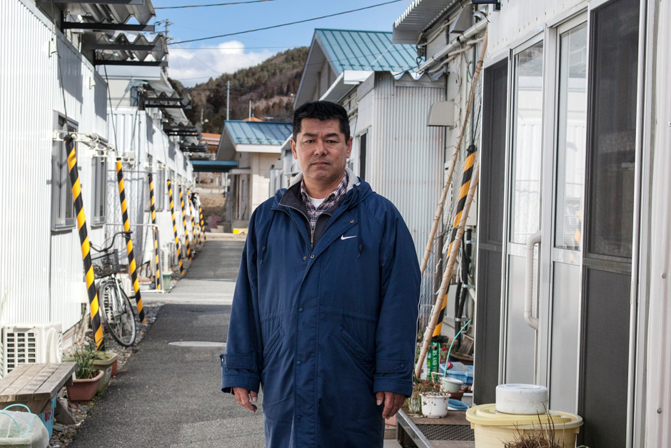 Kazuo Sato, a fisherman before the tsunami, became president of a residents’ association and volunteer fireman. Photograph © Kazuma Obara/The Guardian