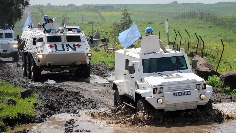 UN peacekeepers of the United Nations Disengagement Observer Force (UNDOF) patrol the Golan Heights area between Camp Faouar and Camp Ziouani, Syria